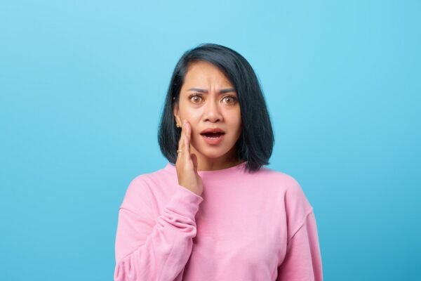 a woman with a surprised look on her face